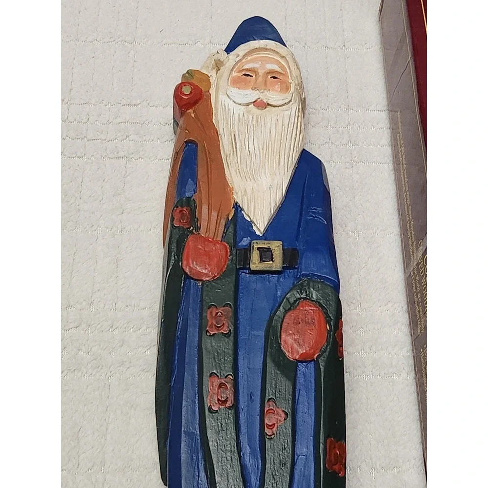 Grandeur Noel Collectors Edition Carved Wood Santa of the World Figures Set Of 2